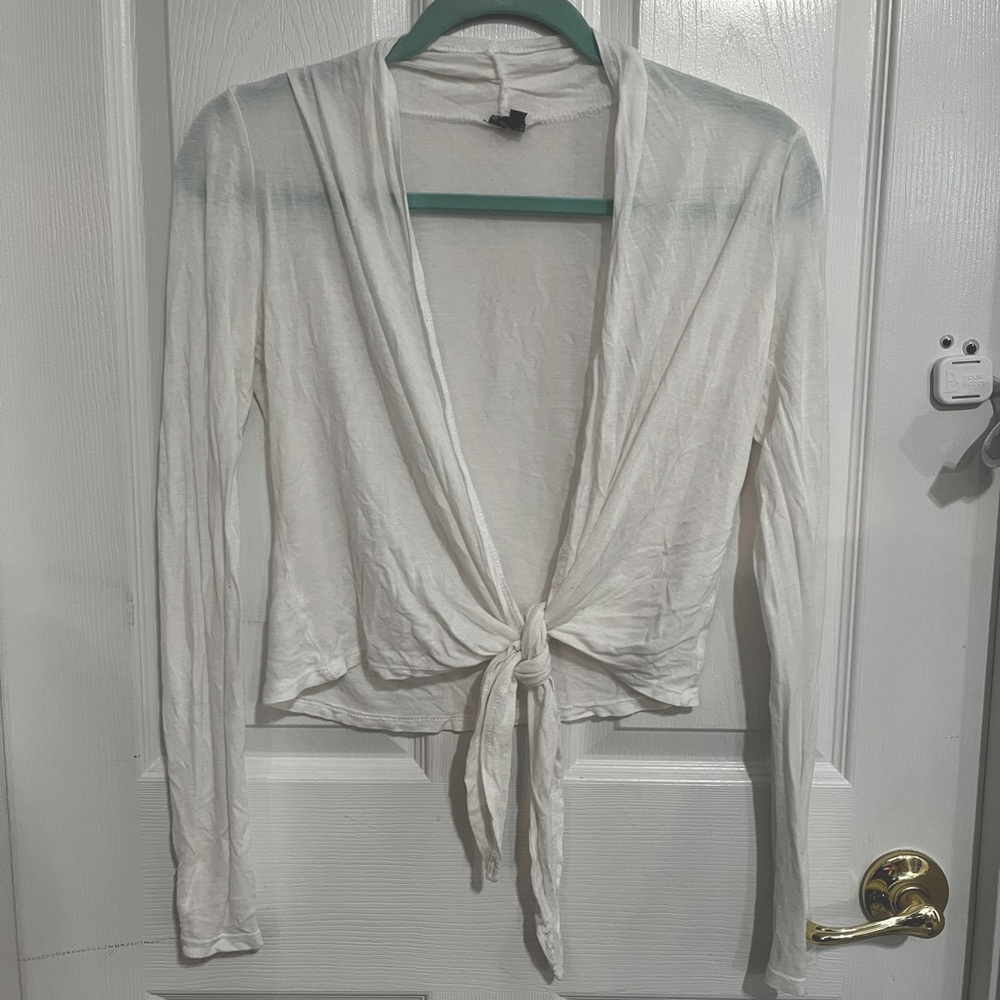 Small white shrug